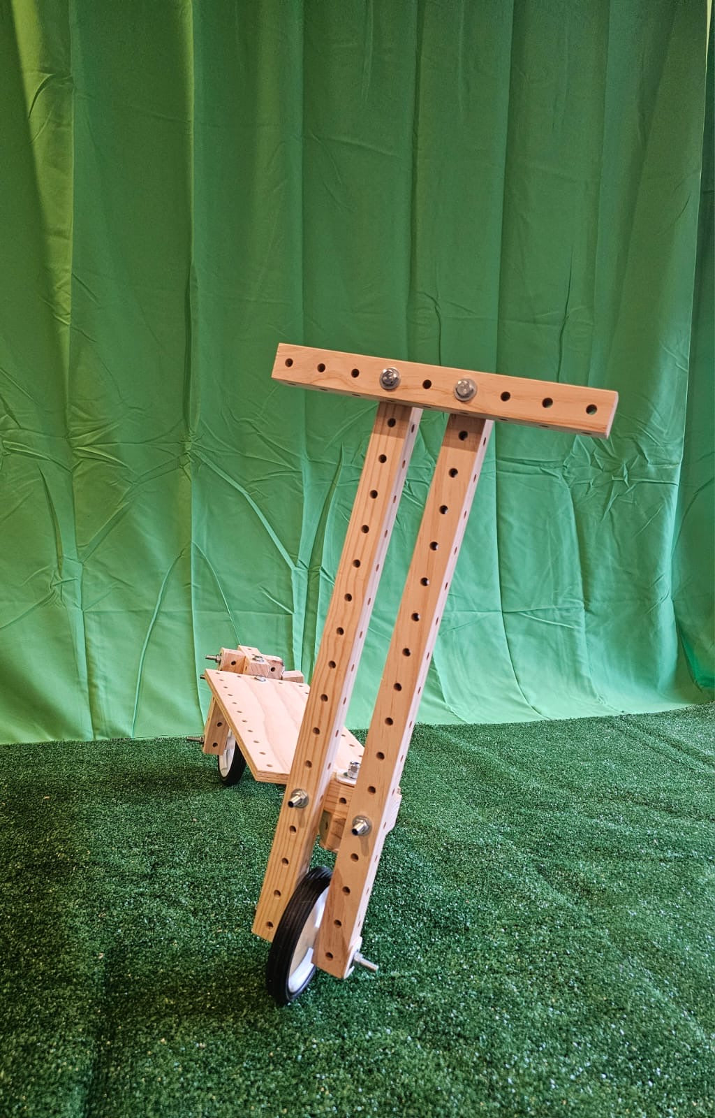 A scooter built from Building Beams with a wheel