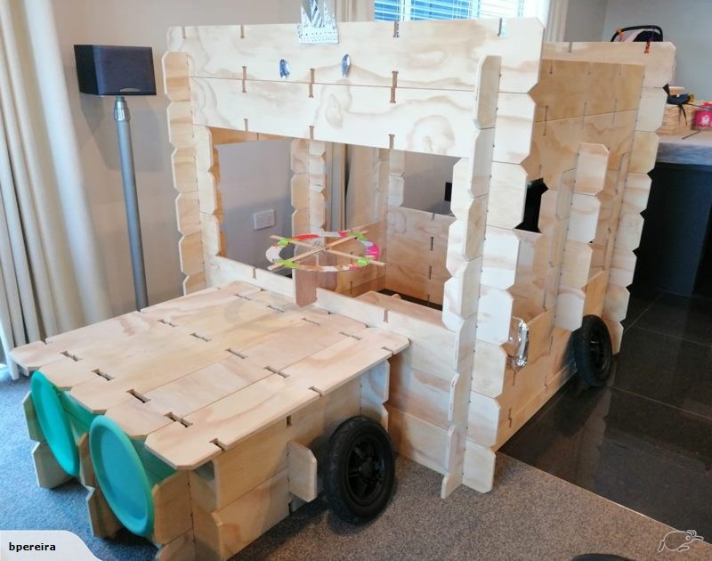 A full-size bus built from Play Planks, complete with wheels and a steering wheel