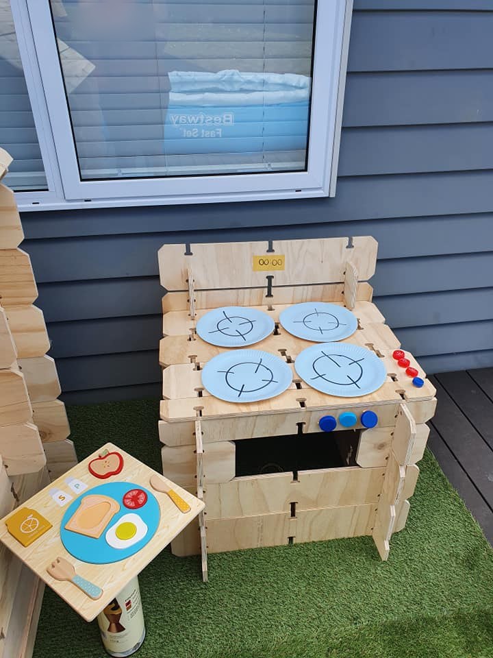 A play kitchen stove built from Play Planks